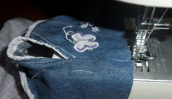 วิธีการเย็บเสื้อผ้าตุ๊กตาด้วยมือของคุณเอง